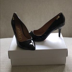 Black patent leather Calvin Klein shoes